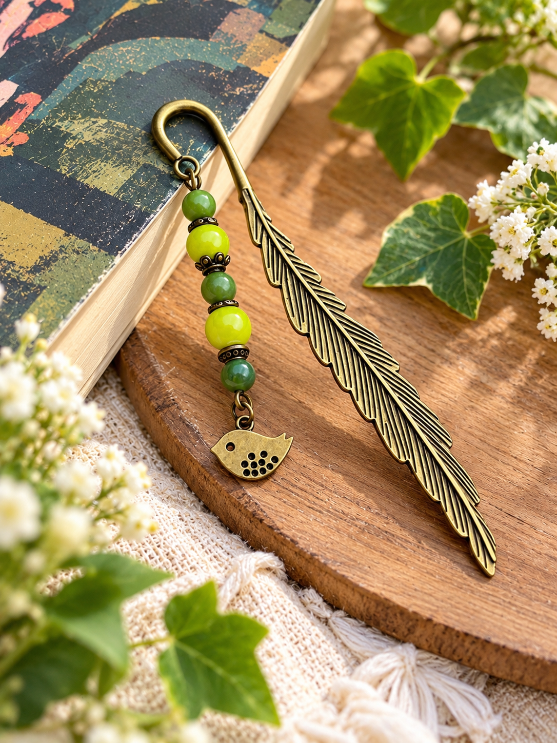 marque page jade oiseau plume ceriz sur le gato